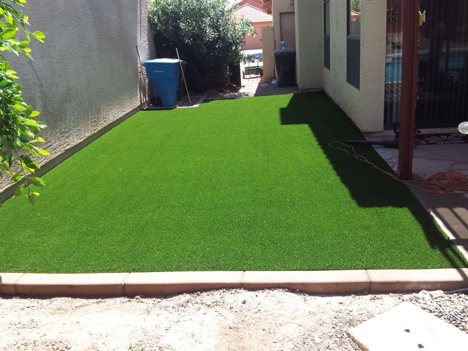 Fix Poor Yard Drainage With Fake Grass in Chandler